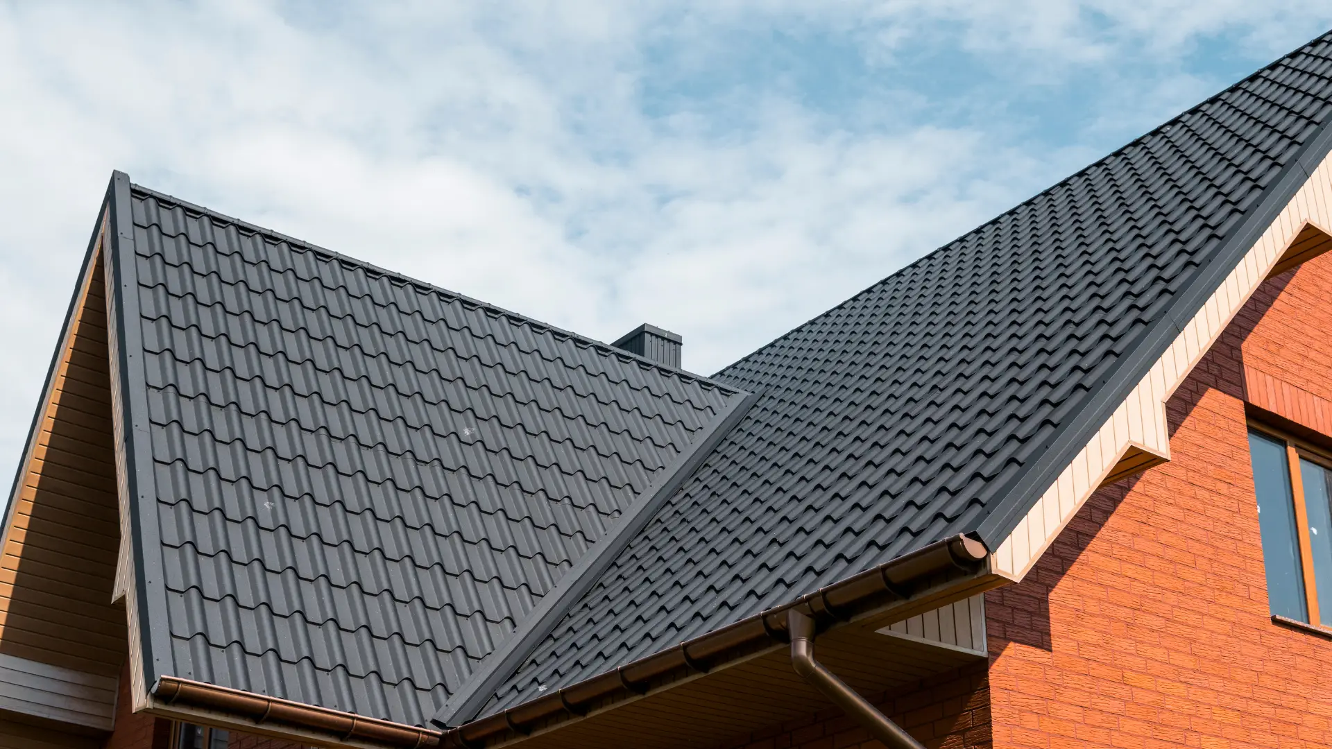 Home roof after a vent installation service, inspected and protected